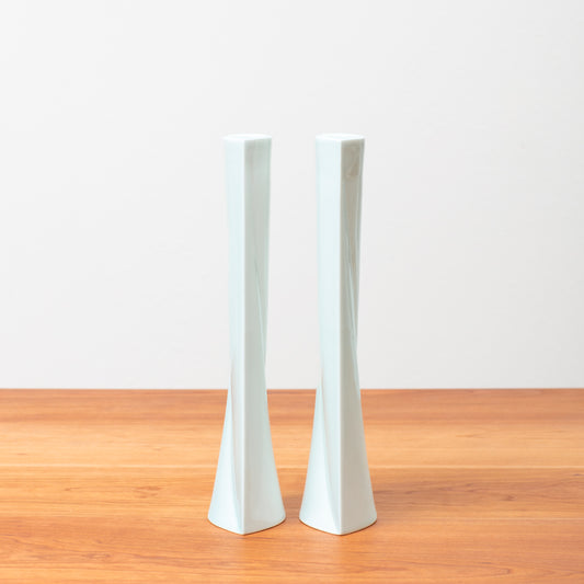 Two Shabbat Candlesticks on a Wooden Table 