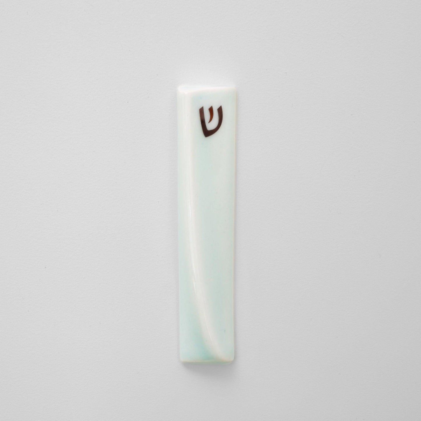 Handcrafted mezuzah with a sleek, modern design, featuring minimalist details and a smooth finish, perfect for adorning doorposts with style and tradition. Available at Green Judaica.